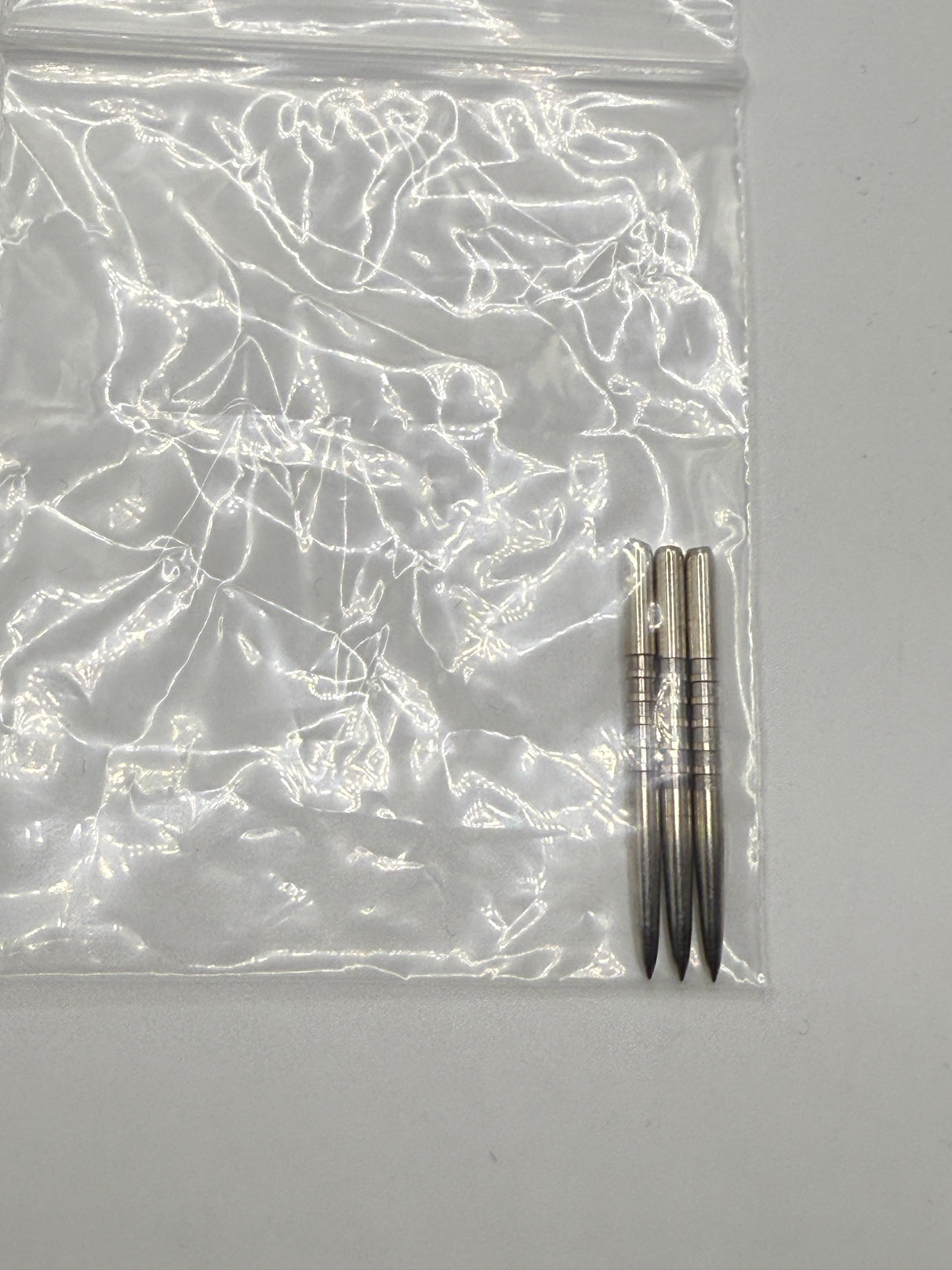Taurus Silver finger grip dart points 32mm